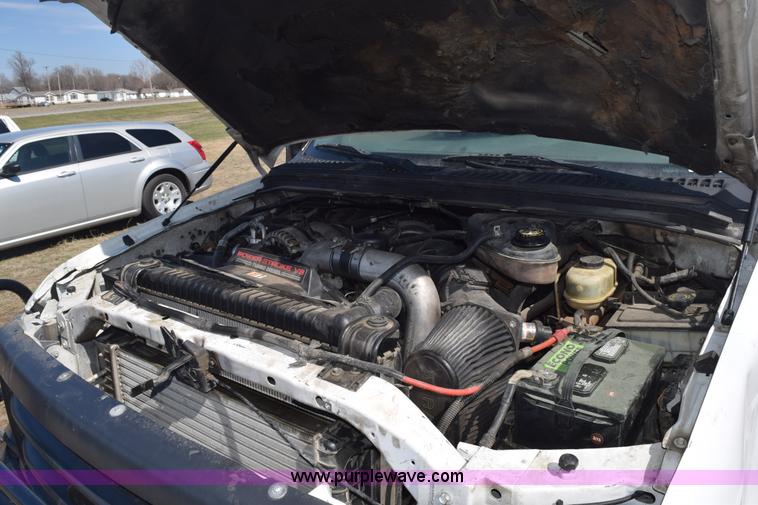 image for item K2446 2004 Ford F550 SuperCab flatbed truck