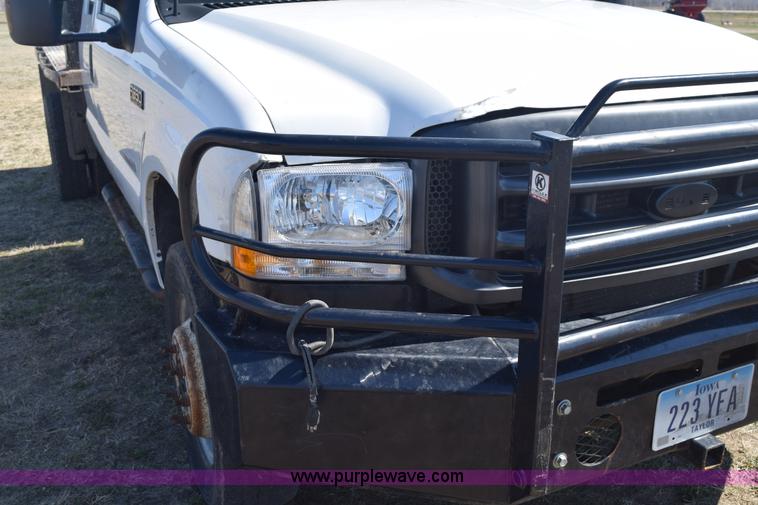 image for item K2446 2004 Ford F550 SuperCab flatbed truck