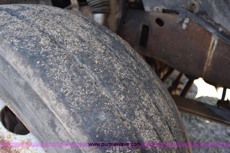 image for item K2446 2004 Ford F550 SuperCab flatbed truck