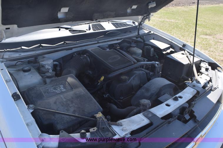 image for item K2446 2004 Ford F550 SuperCab flatbed truck