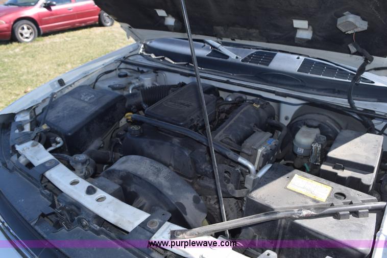 image for item K2446 2004 Ford F550 SuperCab flatbed truck