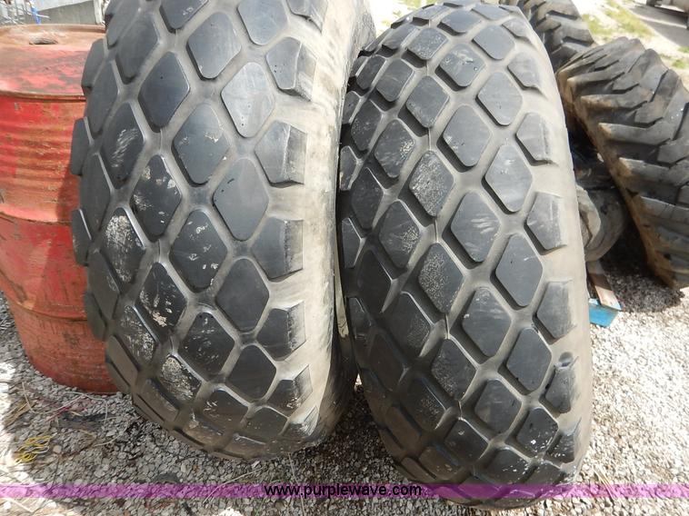 image for item BJ9593 (2) Goodyear 16.9-24 tires and wheels