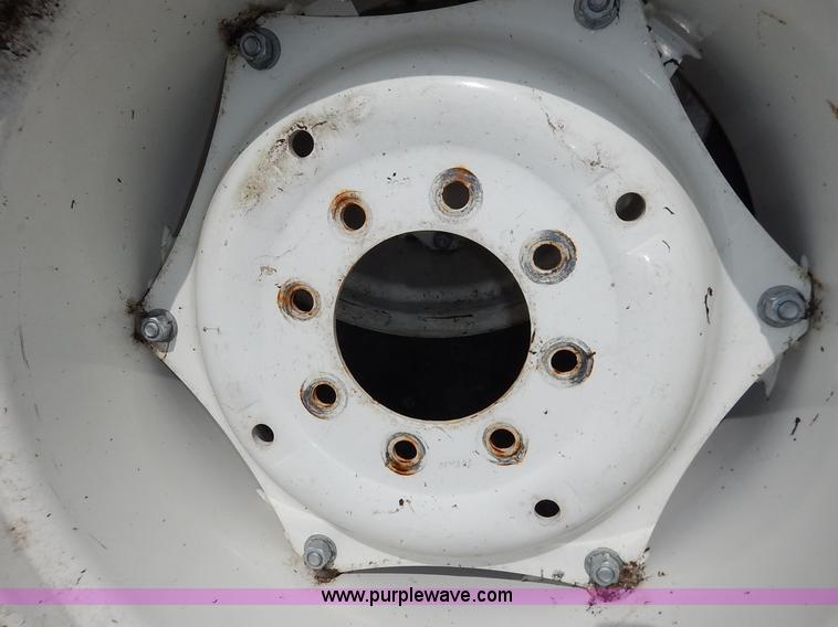 image for item BJ9593 (2) Goodyear 16.9-24 tires and wheels