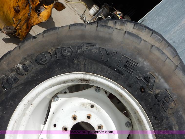 image for item BJ9593 (2) Goodyear 16.9-24 tires and wheels