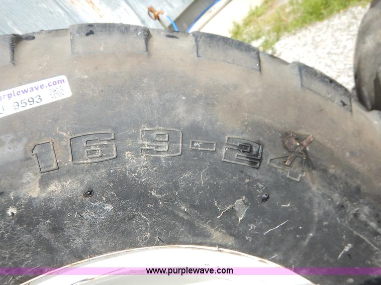 image for item BJ9593 (2) Goodyear 16.9-24 tires and wheels