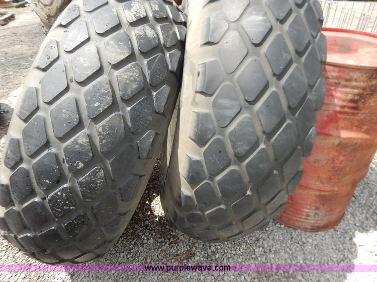 image for item BJ9593 (2) Goodyear 16.9-24 tires and wheels