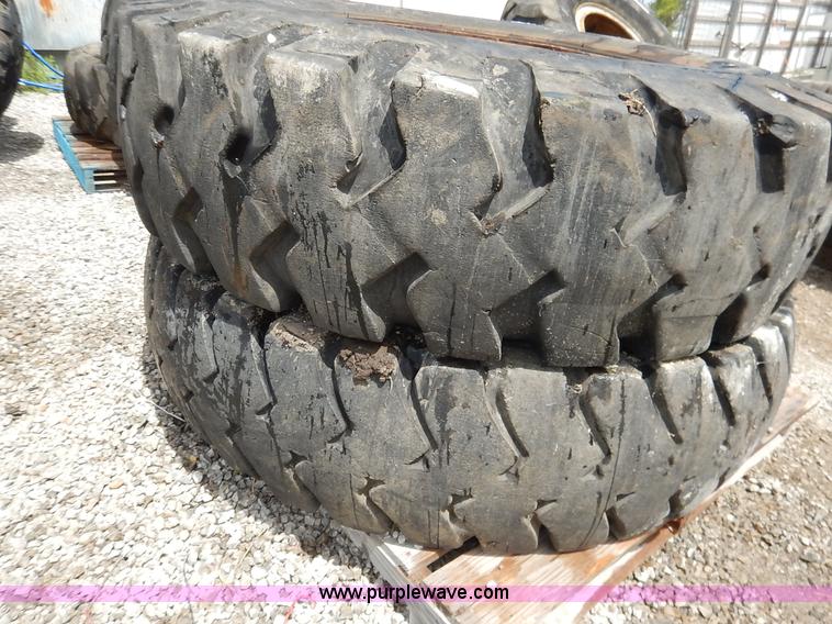 image for item BJ9595 (2) 14.00-24 tires and wheels