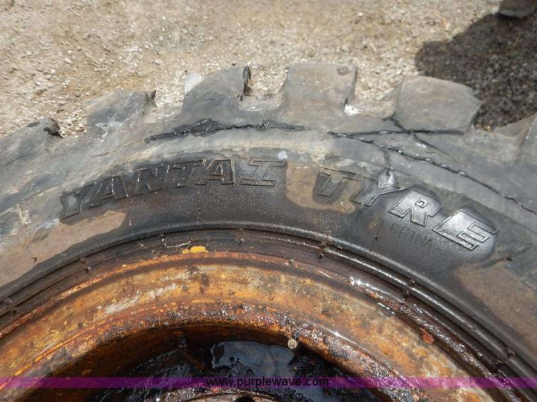 image for item BJ9595 (2) 14.00-24 tires and wheels