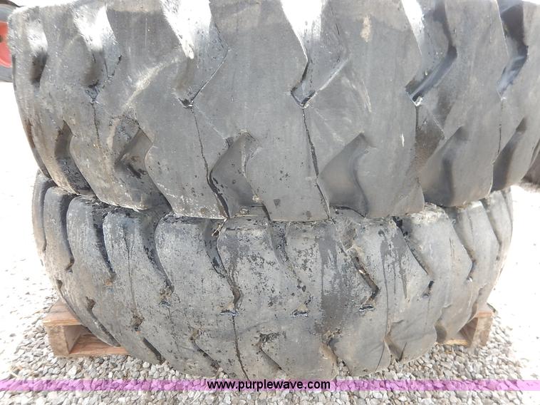 image for item BJ9595 (2) 14.00-24 tires and wheels