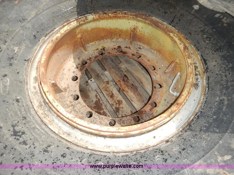 image for item BJ9596 (3) Firestone 16.00-24 tires and wheels