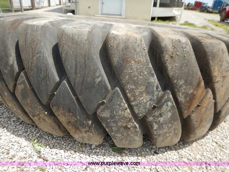 image for item BJ9597 General 18.00-25 tire and wheel