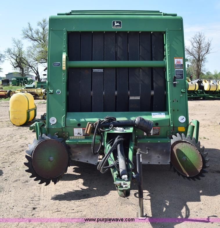 image for item H8619 1998 John Deere 566 round baler