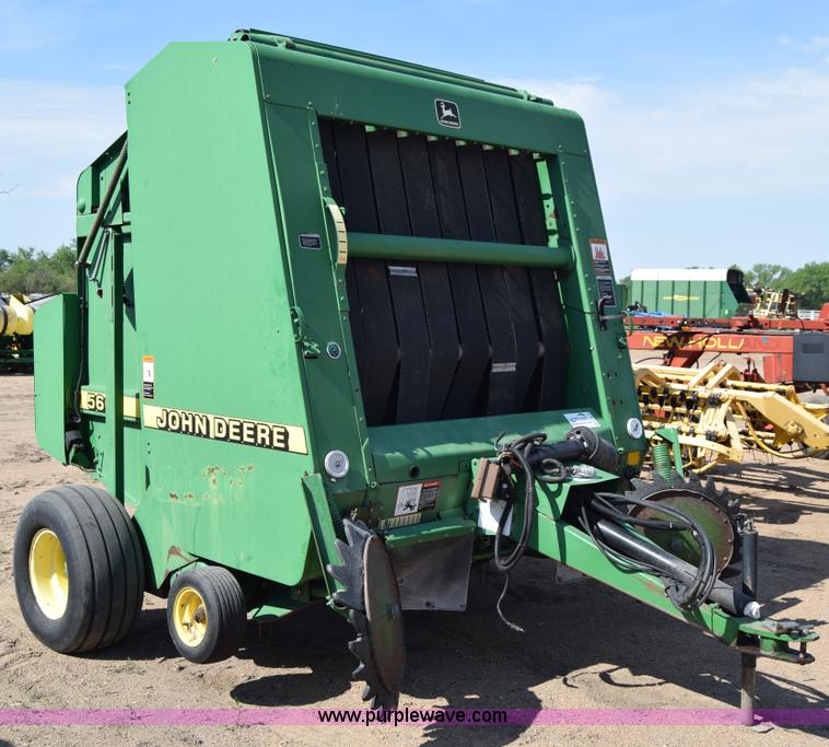 image for item H8619 1998 John Deere 566 round baler