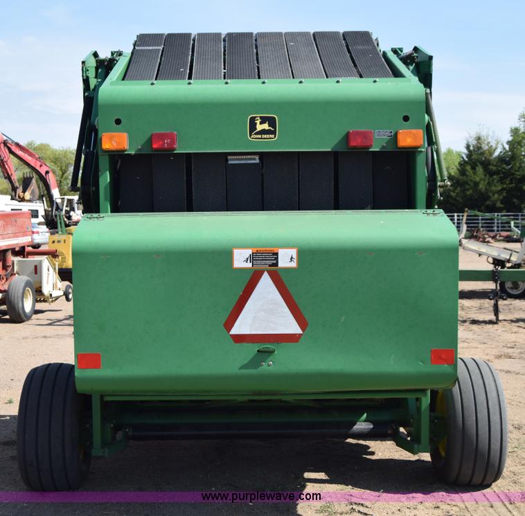 image for item H8619 1998 John Deere 566 round baler