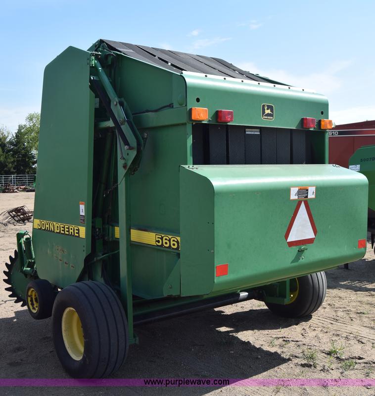 image for item H8619 1998 John Deere 566 round baler