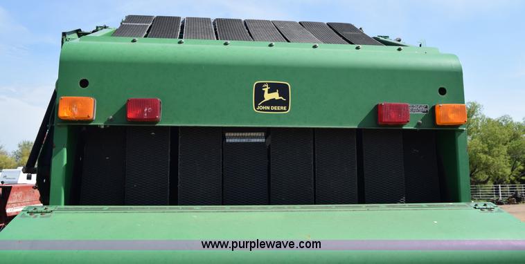 image for item H8619 1998 John Deere 566 round baler