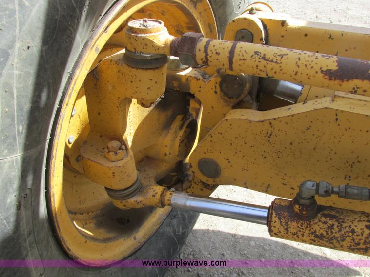 image for item A8778 1998 John Deere 770CH motor grader