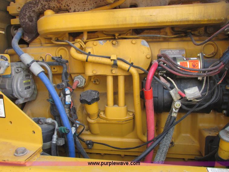 image for item A8778 1998 John Deere 770CH motor grader