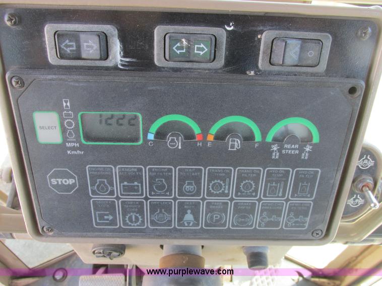 image for item A8778 1998 John Deere 770CH motor grader