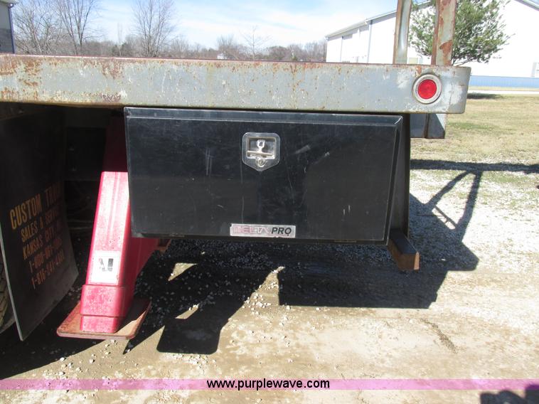 image for item H7553 2000 Sterling L7500 crane truck