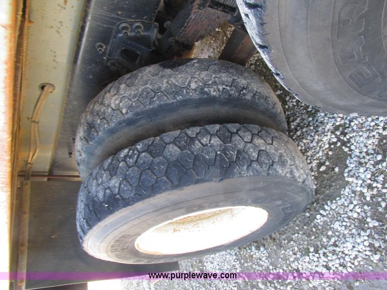 image for item H7553 2000 Sterling L7500 crane truck