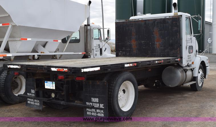 image for item H5164 1995 Volvo WCA flatbed truck