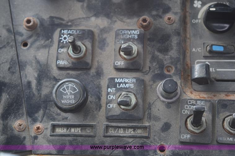 image for item H5164 1995 Volvo WCA flatbed truck