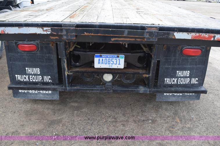 image for item H5164 1995 Volvo WCA flatbed truck
