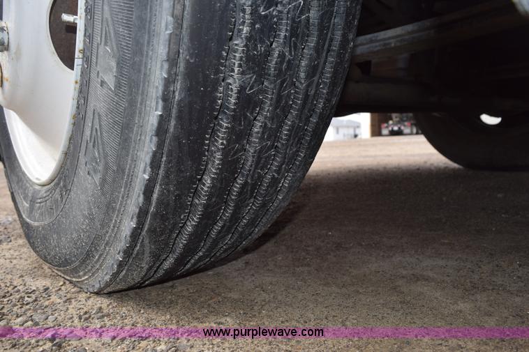 image for item H5164 1995 Volvo WCA flatbed truck