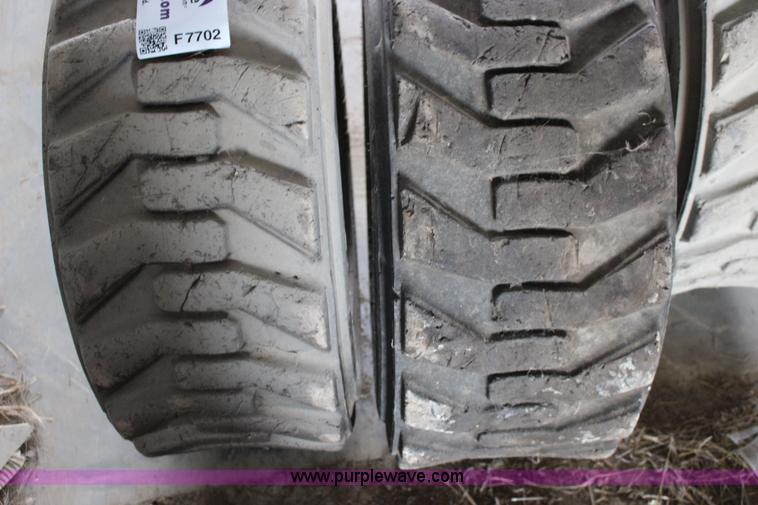 image for item F7702 (8) 12-16.5 NHS skid steer tires