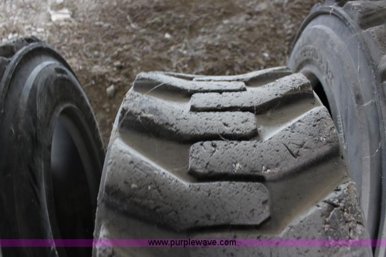 image for item F7702 (8) 12-16.5 NHS skid steer tires