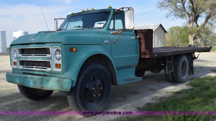 image for item H5118 1970 Chevrolet C60 flatbed dump truck