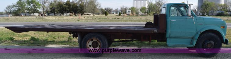 image for item H5118 1970 Chevrolet C60 flatbed dump truck