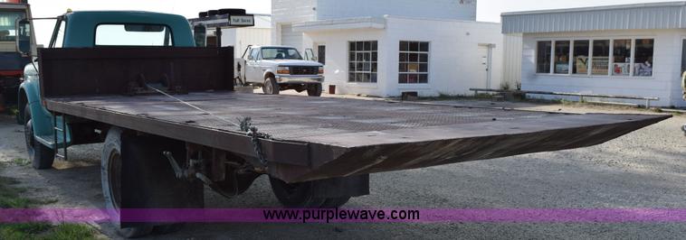 image for item H5118 1970 Chevrolet C60 flatbed dump truck