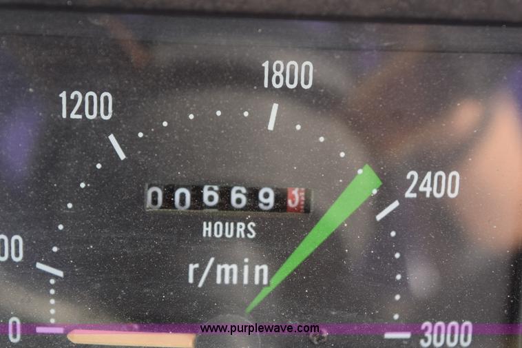 image for item H5120 2003 Taskmaster 438E MFWD tractor