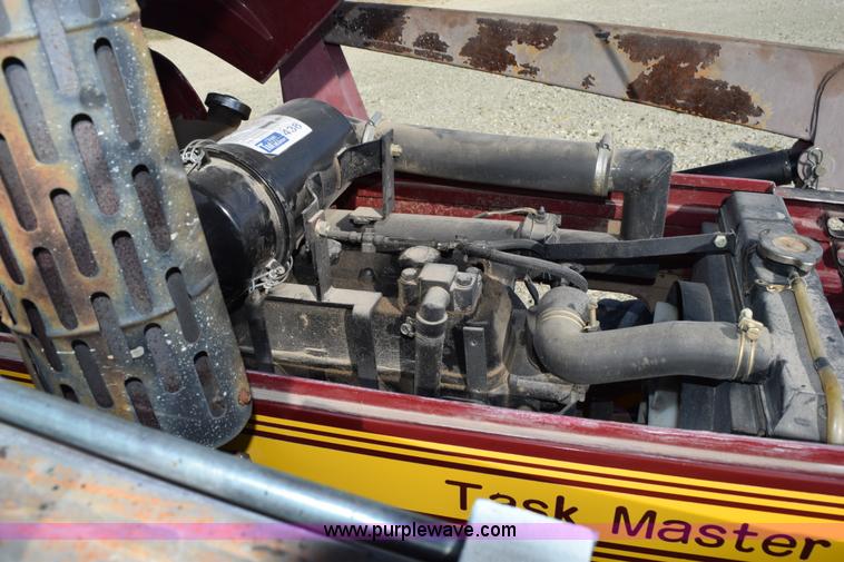 image for item H5120 2003 Taskmaster 438E MFWD tractor