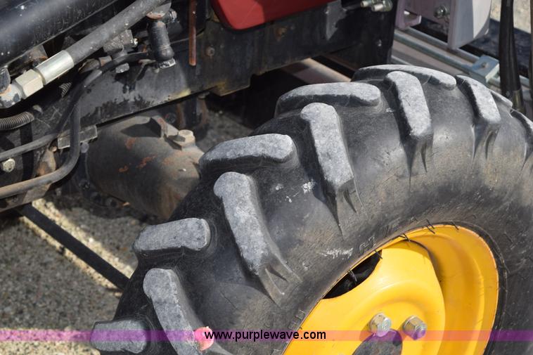 image for item H5120 2003 Taskmaster 438E MFWD tractor