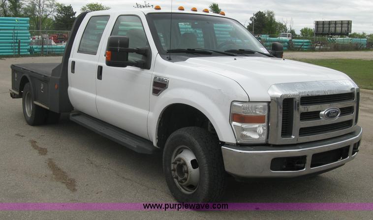 image for item H8646 2008 Ford F350 Super Duty XL Crew Cab flatbed truck