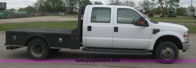 image for item H8646 2008 Ford F350 Super Duty XL Crew Cab flatbed truck