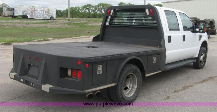 image for item H8646 2008 Ford F350 Super Duty XL Crew Cab flatbed truck
