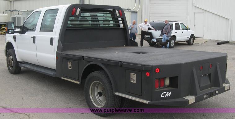 image for item H8646 2008 Ford F350 Super Duty XL Crew Cab flatbed truck