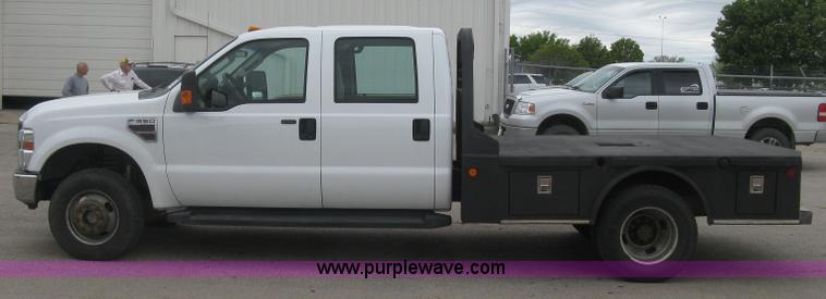 image for item H8646 2008 Ford F350 Super Duty XL Crew Cab flatbed truck
