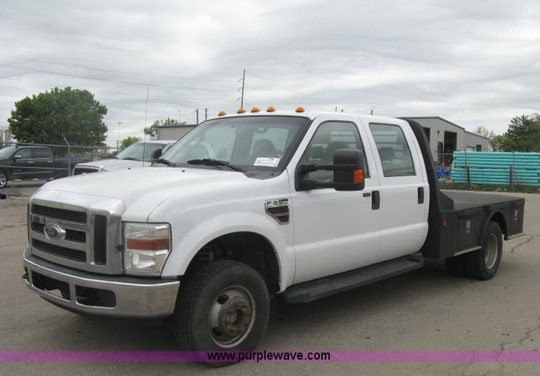 image for item H8646 2008 Ford F350 Super Duty XL Crew Cab flatbed truck