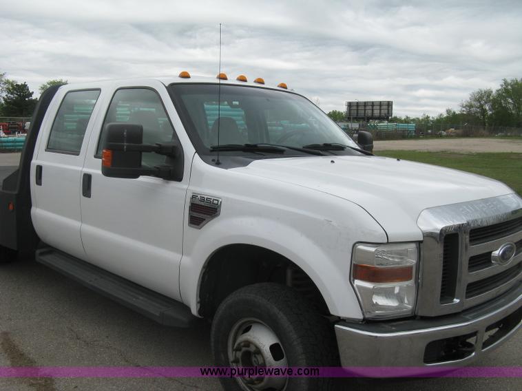 image for item H8646 2008 Ford F350 Super Duty XL Crew Cab flatbed truck