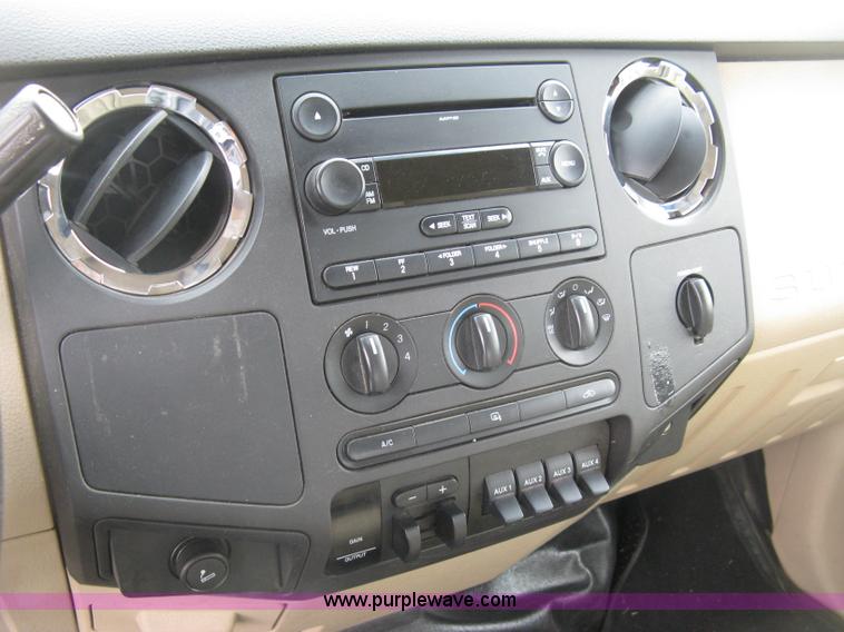 image for item H8646 2008 Ford F350 Super Duty XL Crew Cab flatbed truck