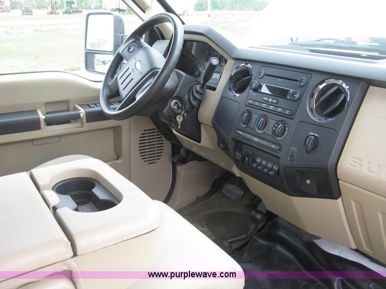 image for item H8646 2008 Ford F350 Super Duty XL Crew Cab flatbed truck