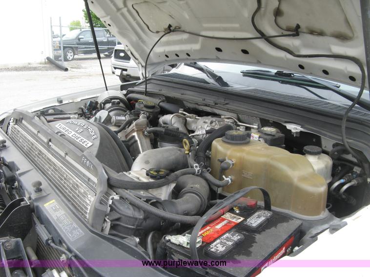 image for item H8646 2008 Ford F350 Super Duty XL Crew Cab flatbed truck