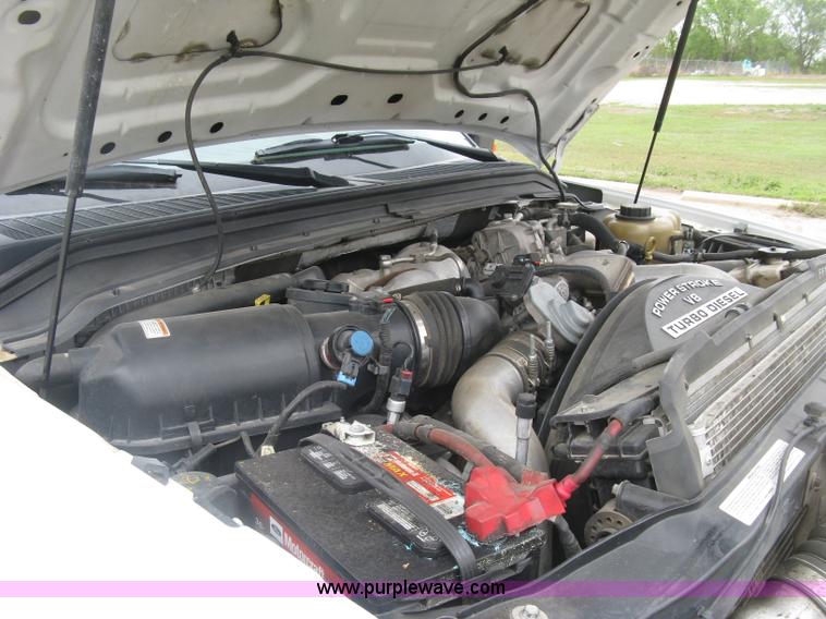 image for item H8646 2008 Ford F350 Super Duty XL Crew Cab flatbed truck