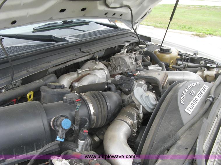 image for item H8646 2008 Ford F350 Super Duty XL Crew Cab flatbed truck