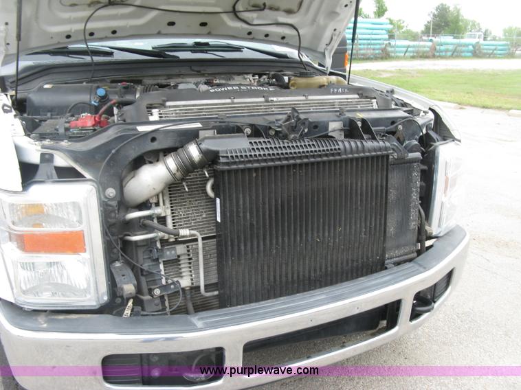 image for item H8646 2008 Ford F350 Super Duty XL Crew Cab flatbed truck